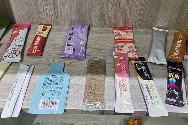 奶茶粉末包裝機可采用三邊封、四邊封、圓角袋型